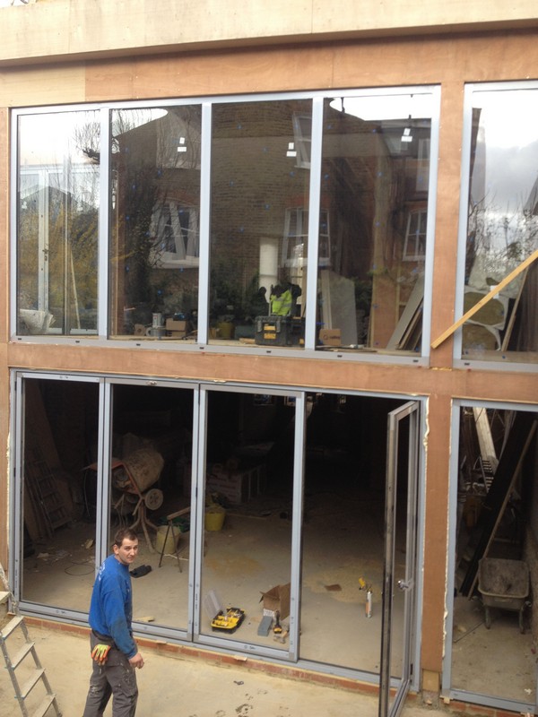 Aluminium bi-fold doors with two-storey glazing in Croydon