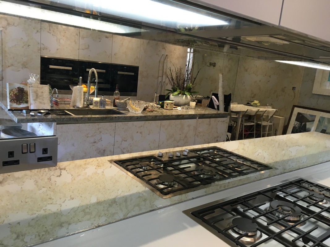 Mirror glass splashback in Croydon luxury kitchen