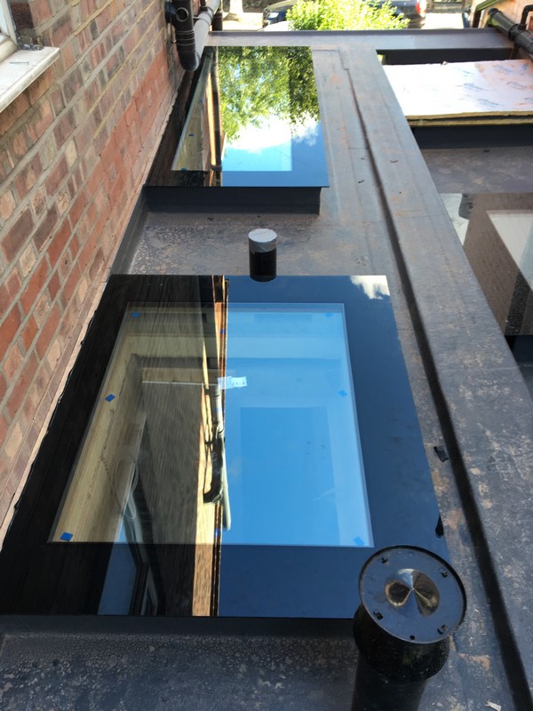 Multiple flat roof skylights on extension in Croydon